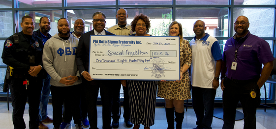  Phi Beta Sigma Fraternity Incorporated presented a large check with a very special donation for the